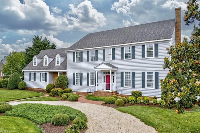 200 Congress Ave, Hampton, VA 23669 - colonial home featuring a front yard and a shingled roof