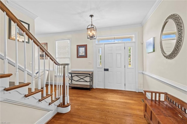 200 Congress Ave, Hampton, VA 23669 - foyer featuring light wood-type flooring, stairs, a chandelier, and ornamental molding
