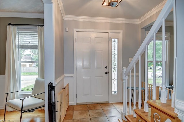 1005 Minden Rd, Virginia Beach, VA 23464 - entryway with healthy amount of natural light, ornamental molding, stairs, and light tile patterned floors
