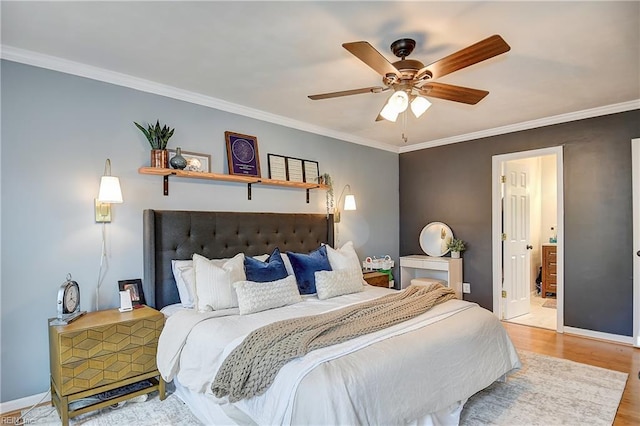 1005 Minden Rd, Virginia Beach, VA 23464 - bedroom featuring wood finished floors, baseboards, ornamental molding, a ceiling fan, and ensuite bath