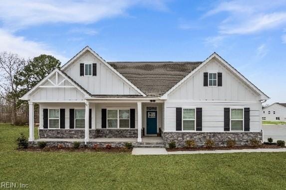 1513 Bogue St, Chesapeake, VA 23322 - modern inspired farmhouse with board and batten siding, a porch, stone siding, and a front yard