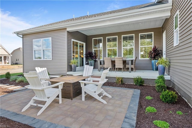 1513 Bogue St, Chesapeake, VA 23322 - view of patio featuring a fire pit and outdoor dining area