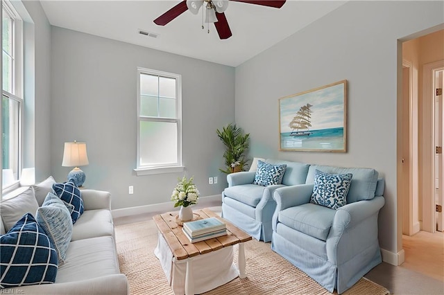 4437 Cherokee Dr, Suffolk, VA 23434 - living area featuring a ceiling fan and baseboards