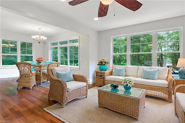 4437 Cherokee Dr, Suffolk, VA 23434 - living room with ceiling fan, wood finished floors, a chandelier, plenty of natural light, and recessed lighting