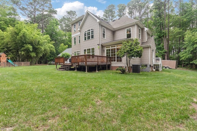 4437 Cherokee Dr, Suffolk, VA 23434 - rear view of property featuring a wooden deck, a lawn, a playground, and cooling unit