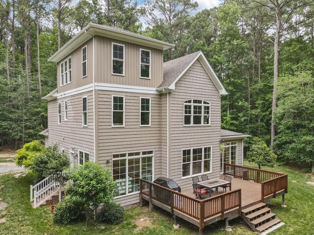 4437 Cherokee Dr, Suffolk, VA 23434 - rear view of house featuring a wooden deck, a shingled roof, and board and batten siding