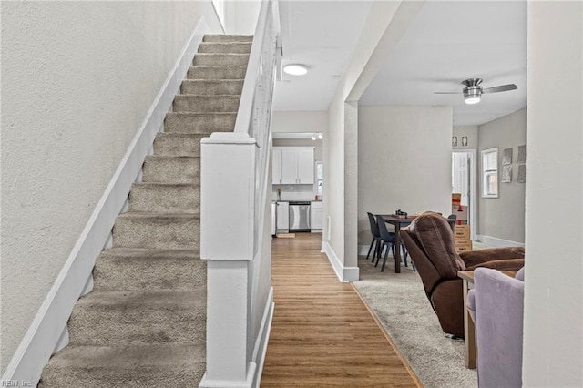 2105 Portlock Rd, Chesapeake, VA 23324 - stairway with a ceiling fan, wood finished floors, a textured wall, and baseboards