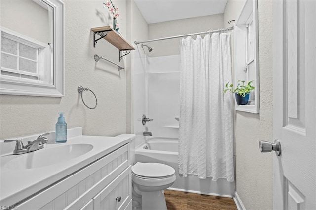 2105 Portlock Rd, Chesapeake, VA 23324 - full bath with vanity, toilet, shower / bath combo, wood finished floors, and baseboards