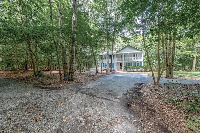 166 Windward Way, Port Haywood, VA 23138 - view of front facade featuring driveway, a porch, and a sunroom