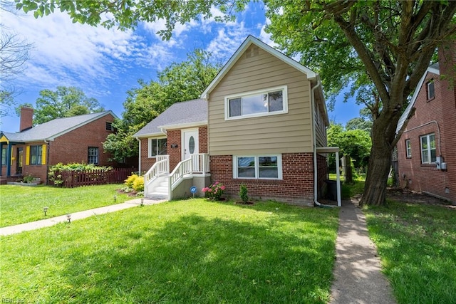 143 Robinson Rd, Hampton, VA 23661 - tri-level home featuring brick siding and a front lawn
