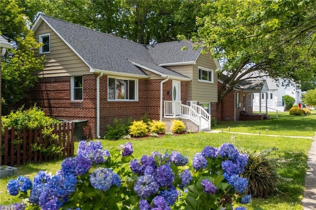 143 Robinson Rd, Hampton, VA 23661 - split level home with brick siding and a shingled roof