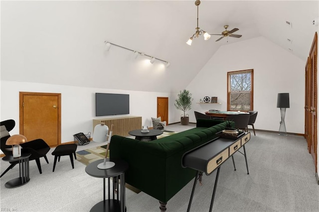 2543 Bridge Rd, Suffolk, VA 23435 - living area with light carpet, vaulted ceiling, track lighting, and baseboards