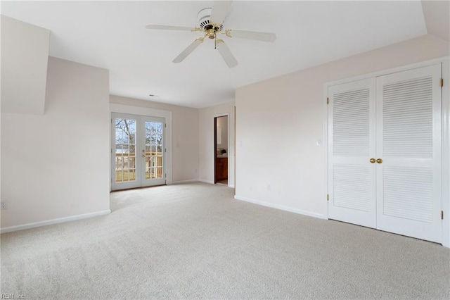 2543 Bridge Rd, Suffolk, VA 23435 - unfurnished bedroom with baseboards, carpet flooring, a closet, a ceiling fan, and french doors