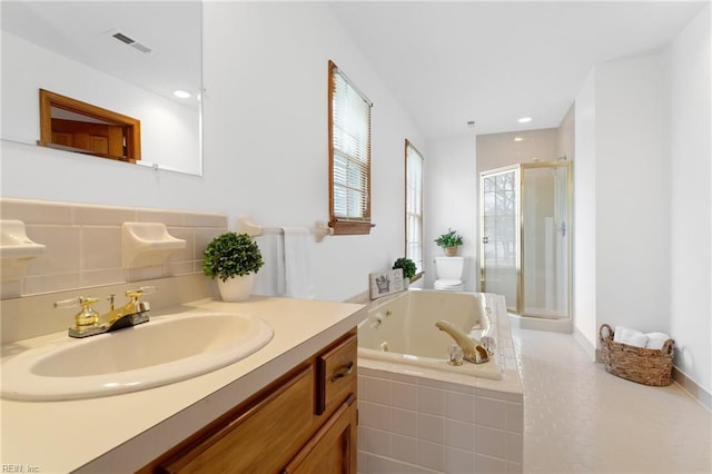 2543 Bridge Rd, Suffolk, VA 23435 - full bath featuring a shower stall, a jetted tub, and vanity