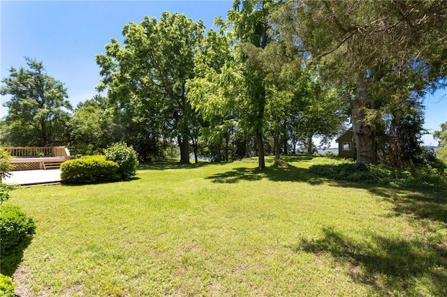 2543 Bridge Rd, Suffolk, VA 23435 - view of grassy yard with a deck