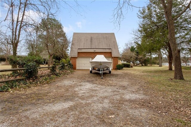 2543 Bridge Rd, Suffolk, VA 23435 - view of property exterior with a shingled roof and dirt driveway