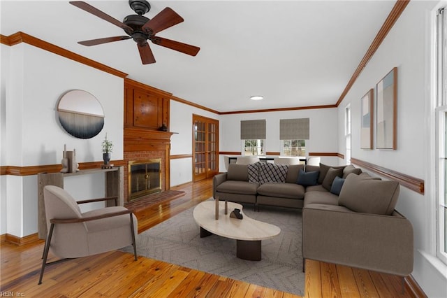 2543 Bridge Rd, Suffolk, VA 23435 - living area with light wood finished floors, crown molding, baseboards, ceiling fan, and recessed lighting