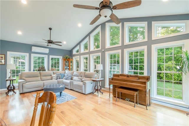 3512 Quail Holw, Williamsburg, VA 23185 - living area with ceiling fan, high vaulted ceiling, a wall mounted AC, light wood-style flooring, and recessed lighting