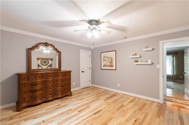 3512 Quail Holw, Williamsburg, VA 23185 - bedroom featuring light wood finished floors, crown molding, baseboards, and a textured ceiling