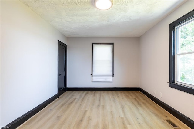 1943 Sycamore Ln, Norfolk, VA 23523 - unfurnished room with light wood-style flooring and baseboards