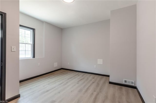 1943 Sycamore Ln, Norfolk, VA 23523 - spare room featuring wood finished floors and baseboards