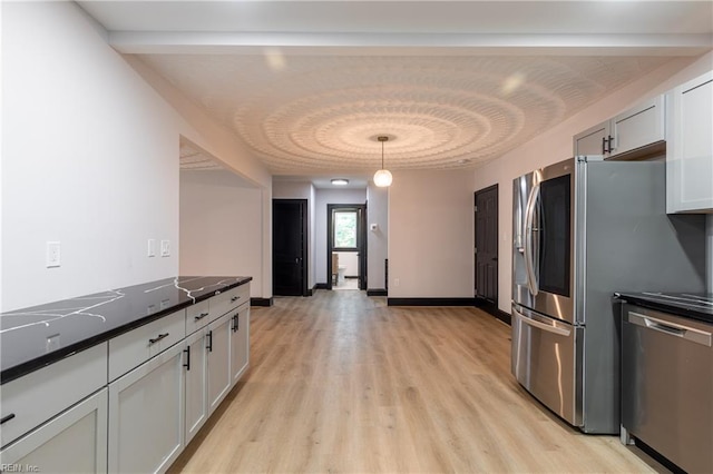1943 Sycamore Ln, Norfolk, VA 23523 - kitchen with appliances with stainless steel finishes, light wood-type flooring, decorative light fixtures, baseboards, and white cabinetry