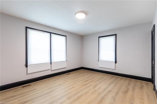 1943 Sycamore Ln, Norfolk, VA 23523 - spare room featuring wood finished floors and baseboards