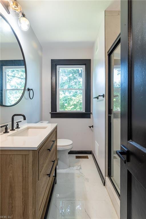 1943 Sycamore Ln, Norfolk, VA 23523 - full bathroom with vanity, toilet, a shower with door, and marble finish flooring