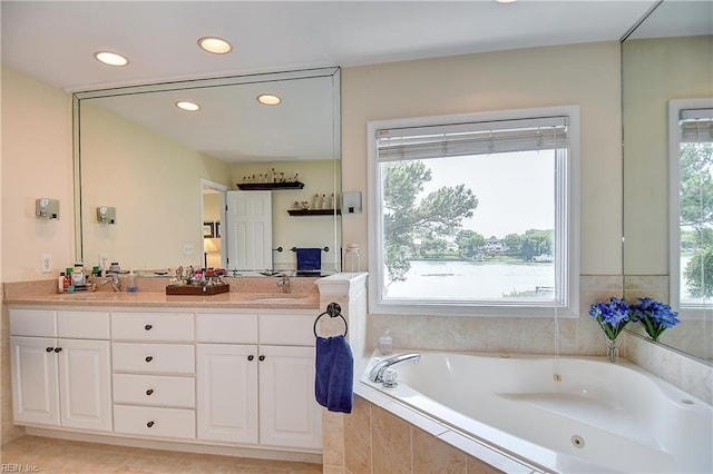 2637 Broad Bay Rd, Virginia Beach, VA 23451 - full bathroom with a tub with jets, double vanity, recessed lighting, and tile patterned flooring