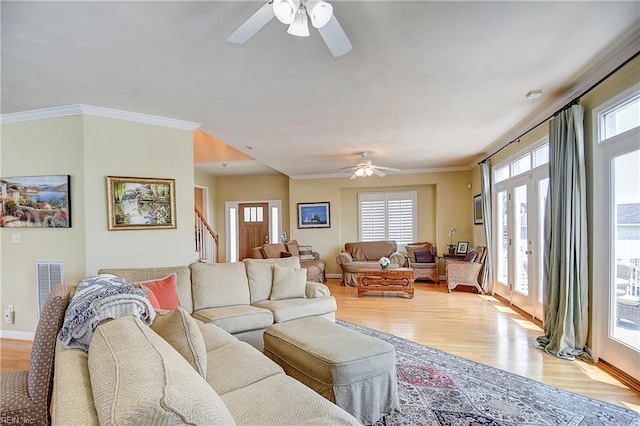 2637 Broad Bay Rd, Virginia Beach, VA 23451 - living area with a ceiling fan, light wood-type flooring, baseboards, stairway, and ornamental molding