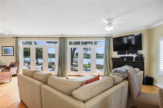 2637 Broad Bay Rd, Virginia Beach, VA 23451 - living area with a ceiling fan, ornamental molding, light wood-style floors, french doors, and baseboards