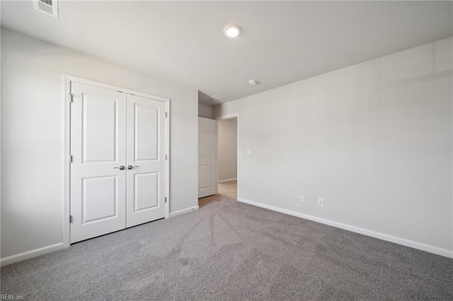 1232 Kidbrooke St, Chesapeake, VA 23322 - unfurnished bedroom featuring baseboards, carpet floors, and a closet