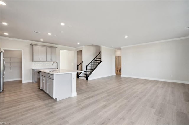 1232 Kidbrooke St, Chesapeake, VA 23322 - kitchen featuring gray cabinets, crown molding, recessed lighting, a sink, and baseboards