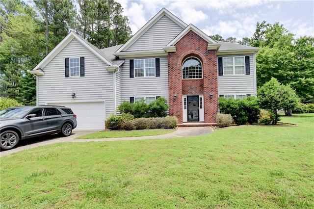 313 Queen Ct, Smithfield, VA 23430 - view of front facade featuring a garage, a front lawn, and concrete driveway