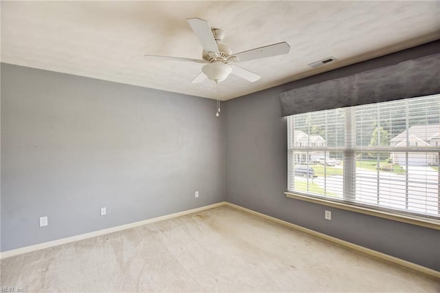 313 Queen Ct, Smithfield, VA 23430 - spare room featuring carpet floors, baseboards, and ceiling fan