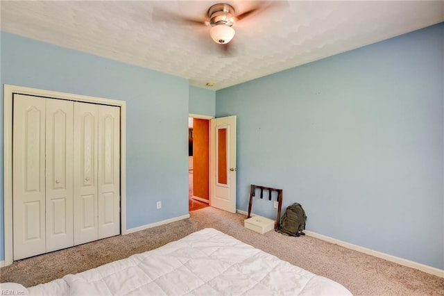 313 Queen Ct, Smithfield, VA 23430 - bedroom featuring carpet floors, a closet, baseboards, and ceiling fan