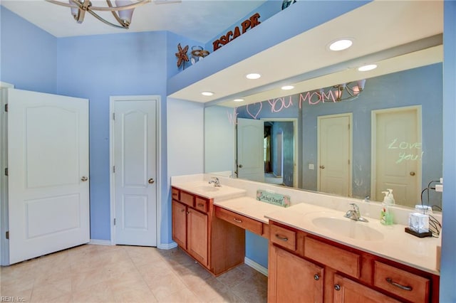 313 Queen Ct, Smithfield, VA 23430 - bathroom with double vanity, a chandelier, recessed lighting, baseboards, and tile patterned floors