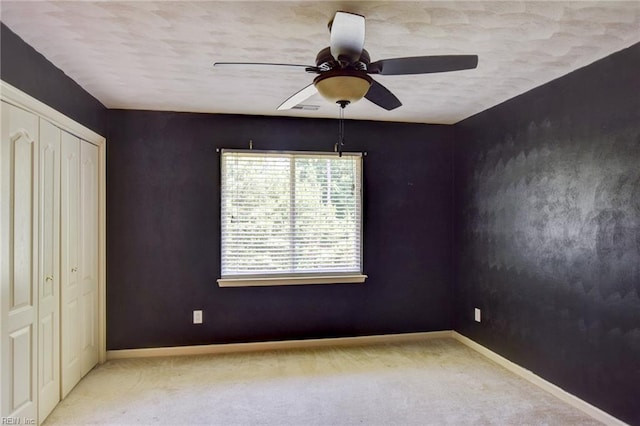 313 Queen Ct, Smithfield, VA 23430 - unfurnished bedroom featuring carpet floors, baseboards, a closet, and ceiling fan