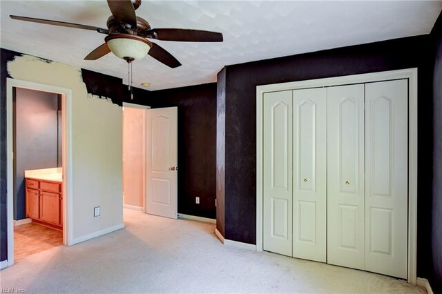 313 Queen Ct, Smithfield, VA 23430 - unfurnished bedroom featuring light carpet, baseboards, a closet, ensuite bathroom, and ceiling fan