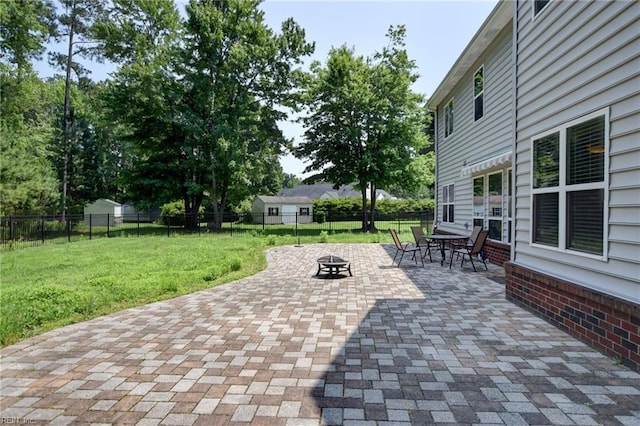 313 Queen Ct, Smithfield, VA 23430 - view of patio featuring a fire pit and outdoor dining area