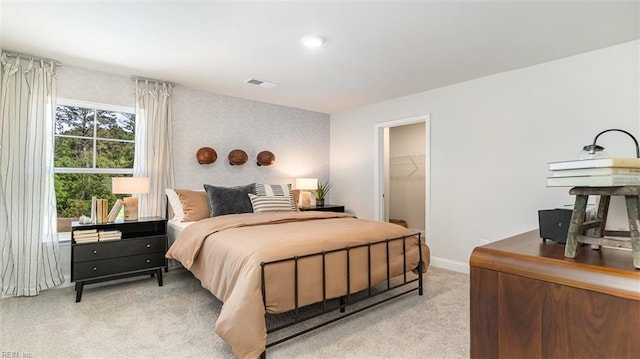 1228 Kidbrooke St, Chesapeake, VA 23322 - bedroom featuring light carpet, baseboards, a walk in closet, and wallpapered walls