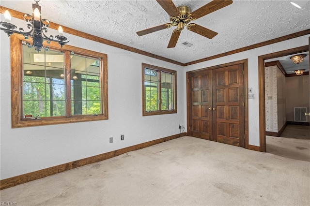 9 Hill Way, Carrollton, VA 23314 - unfurnished bedroom with carpet floors, baseboards, a textured ceiling, a chandelier, and ornamental molding