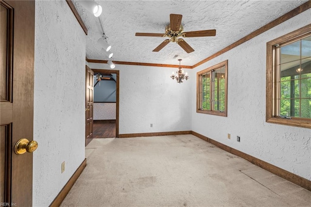 9 Hill Way, Carrollton, VA 23314 - carpeted spare room with a textured wall, healthy amount of natural light, ornamental molding, a textured ceiling, and a ceiling fan