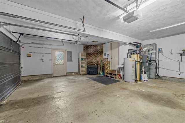 9 Hill Way, Carrollton, VA 23314 - garage featuring water heater, a garage door opener, and electric panel