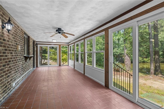 9 Hill Way, Carrollton, VA 23314 - unfurnished sunroom featuring a ceiling fan and plenty of natural light