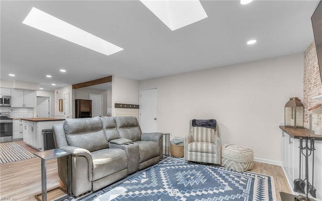 2012 Damascus Ct, Virginia Beach, VA 23453 - living area featuring a skylight, light wood-style floors, recessed lighting, and baseboards