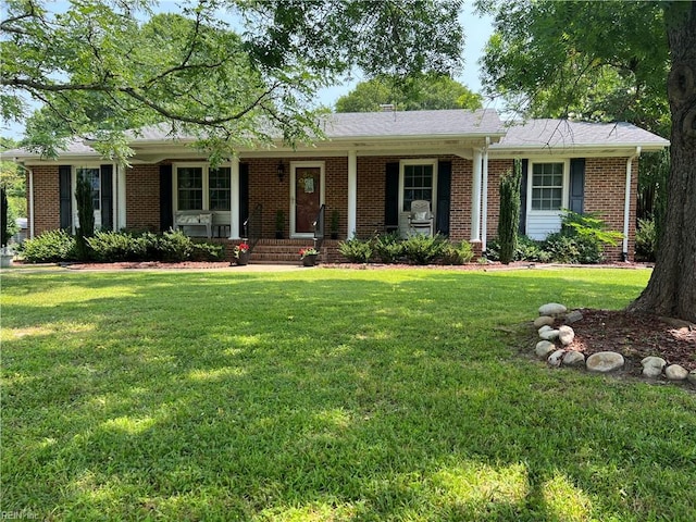 432 Crescent Dr, Franklin, VA 23851 - ranch-style home with brick siding and a front lawn