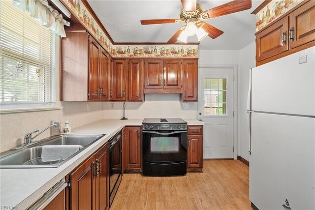 3435 Macdonald Rd, Virginia Beach, VA 23464 - kitchen featuring black appliances, a sink, and light countertops