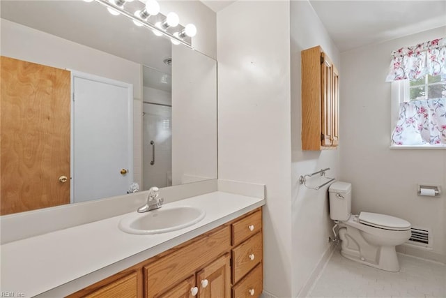 3435 Macdonald Rd, Virginia Beach, VA 23464 - full bath with vanity, baseboards, toilet, a shower with door, and tile patterned flooring