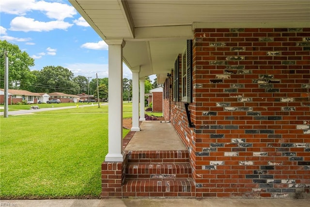 3435 Macdonald Rd, Virginia Beach, VA 23464 - covered porch featuring a lawn